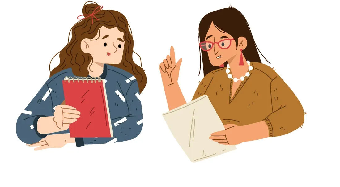 Two students reviewing a finished homework assignment together